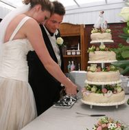 Bryllupsfoto, kagen skæres
